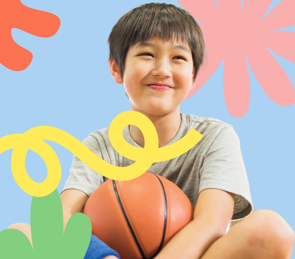 Small boy holding a basketball